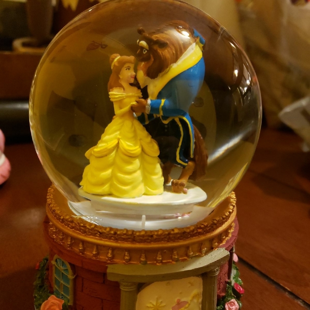 A beauty and the Beast snow globe